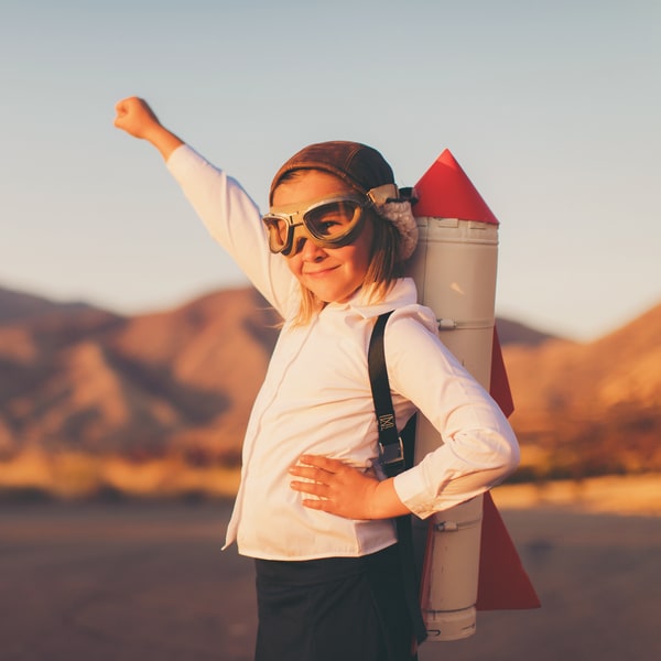 A photo of kid in the rocket man costume