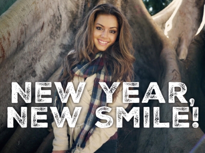 Woman in a jacket is smiling