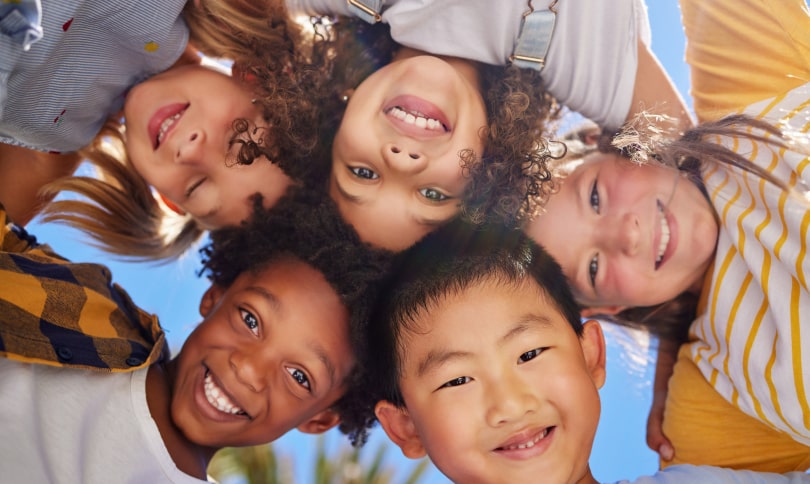 A phot of group of kids with happy smile
