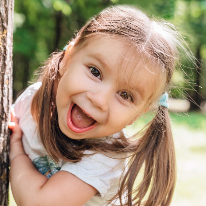 A photo of happily smiling little girl
