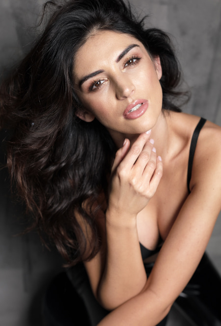 A photo of woman in black dress