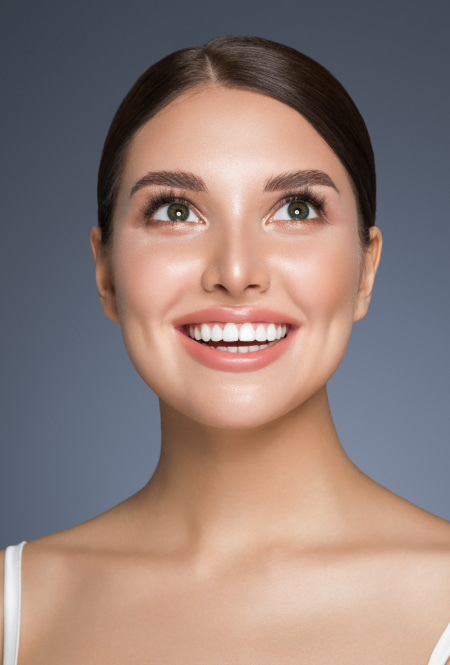 A woman show her best smile