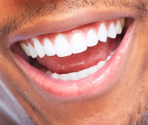 Adult man is smiling