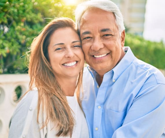 A couple smiling