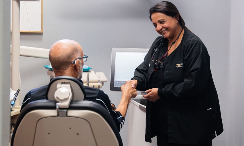 Patient and doctor shaking hands