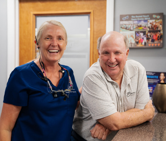 Doctor and patient are happy smiling