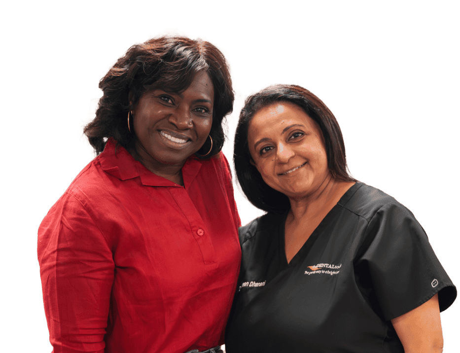 A photo of our smiling patient with Dr. Dhanani