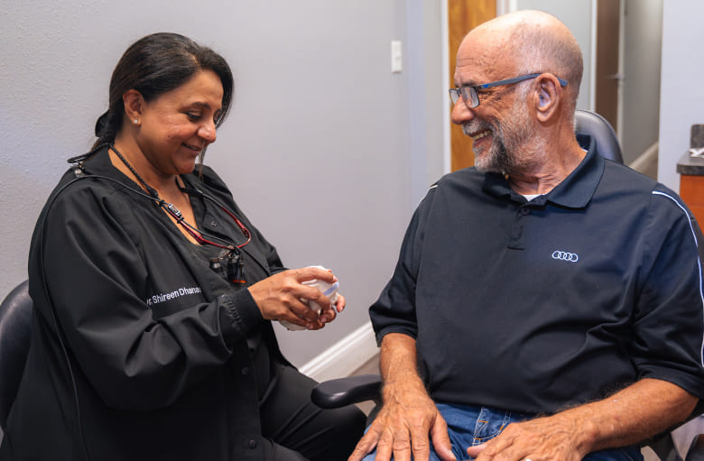 Doctor and patient talking about dentistry