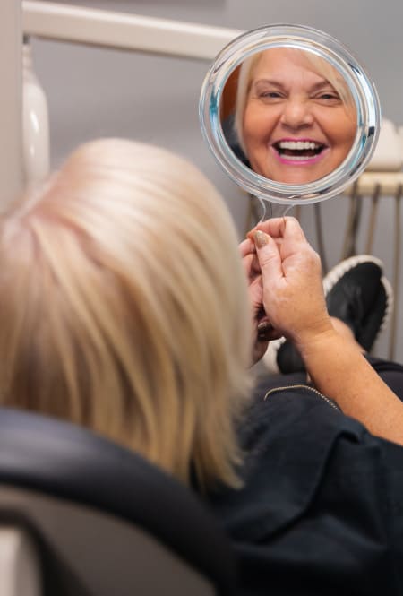 Lady with mirror in the hand