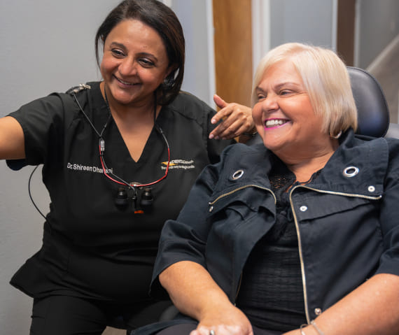 Photo of a doctor and patient in dental chair