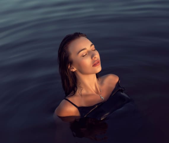Photo of woman relaxing in the sea