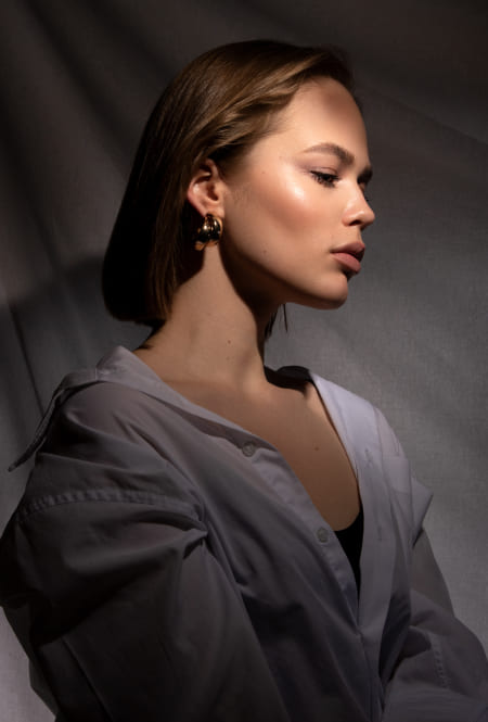 Portrait of woman in white shirt