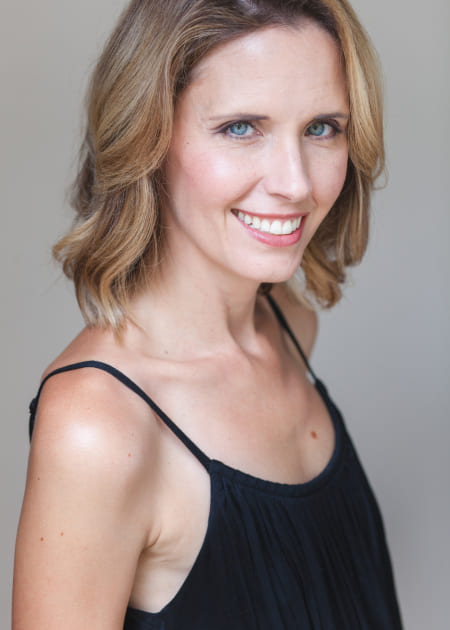 Smiling woman wearing black top